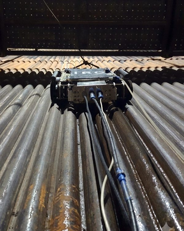 Crawler robot inspecting boiler water wall tubes